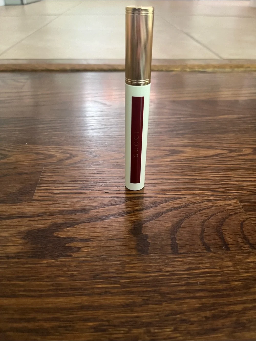 Gucci Oil-In-Water Tint Hydrating Stain in shade 129 “Paula Maple” (maple red)